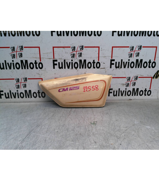 Flanc de selle Droit HONDA CM 125 - 1993 Flanc de selle Droit HONDA CM 125 - 1993